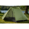 Green tent with open front flap and visible mesh inner door, pitched on grass, lake and line of trees in the background, tree trunk visible at right