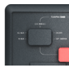 Gros plan d'une face d'appareil gris foncé avec l'inscription TEMPRA 540, un module I/O carré gris foncé, les étiquettes CI-BUS, N-BUS, ON/OFF, DIP SWITCH et un bouton rectangulaire rouge à droite