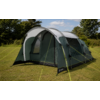 Green tunnel tent pitched on grass with stretched bright yellow guy lines, front door open, trees and blue sky in the background
