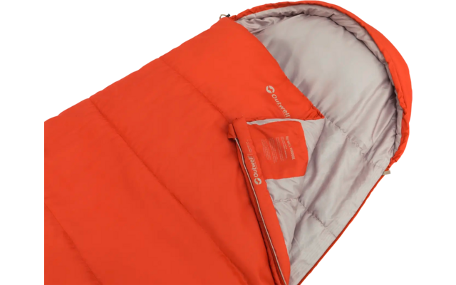Rode slaapzak met lichtgekleurde voering en open ritssluiting