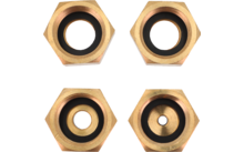 Four hexagonal gold-colored metal rings with black inner rings and central openings of varying sizes, arranged in two rows of two on a white background