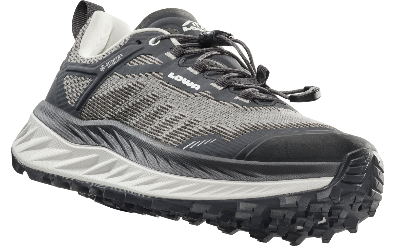 Grauer Sportschuh mit schwarzen und weißen Details, seitliche Ansicht