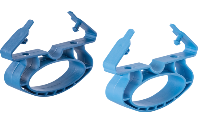 Two blue plastic rings with hinged, clamp-like arms on a white surface