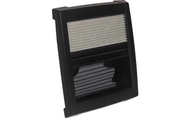 Schwarzes rechteckiges Kunststoffgehäuse mit oben hellgrauer, geriffelter Fläche und unten dunklem, glänzendem Lamellenfeld mit horizontalen Linien