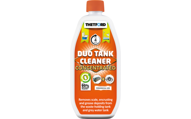 Bouteille en plastique blanche avec bouchon à vis orange et étiquette orange. Sur l'étiquette on voit en haut 'THETFORD', au centre 'DUO TANK CLEANER CONCENTRATED', un cercle avec '4', un symbole '95% biodegradable' et le texte en anglais 'Removes scale, encrusting and grease deposits from the waste-holding tank and grey water tank'