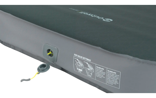 Zwart opblaasbaar matras met ventiel en instructielabel