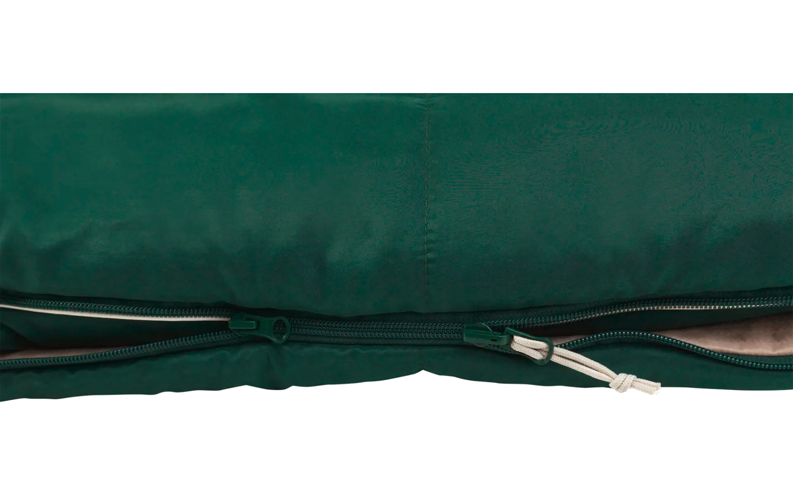 Groen kussen met open ritssluiting en zichtbaar licht binnenmateriaal