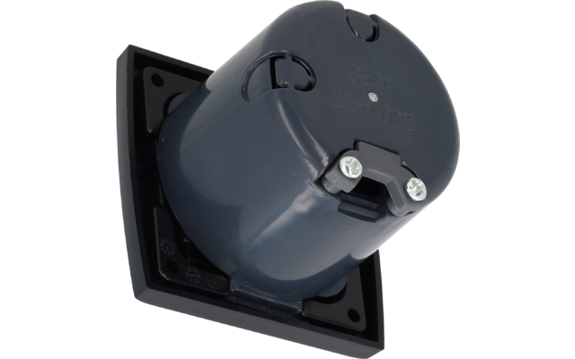 Gray cylindrical plastic housing in a black rectangular frame with two visible metal screws, photographed at an angle