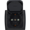 Black electrical outlet with round inner section, two round contact holes and open flip cover