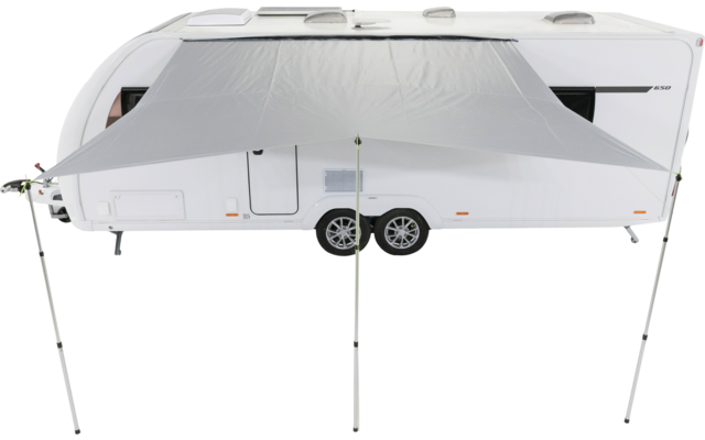 White caravan with two axles and a stretched gray canopy supported by three vertical poles, on a white background