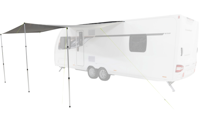 White caravan with extended dark gray awning supported by three poles and secured with yellow guy lines