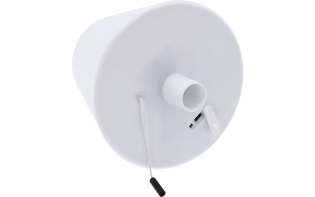Weißes rundes Objekt mit zylindrischer Öffnung, schmalem Schlitz und einer Zugkordel mit schwarzem Griff