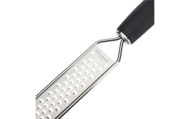 Platte metalen rasp met kleine rechthoekige gaten en zwart handvat op witte achtergrond; merknaam 'WESTMARK' zichtbaar