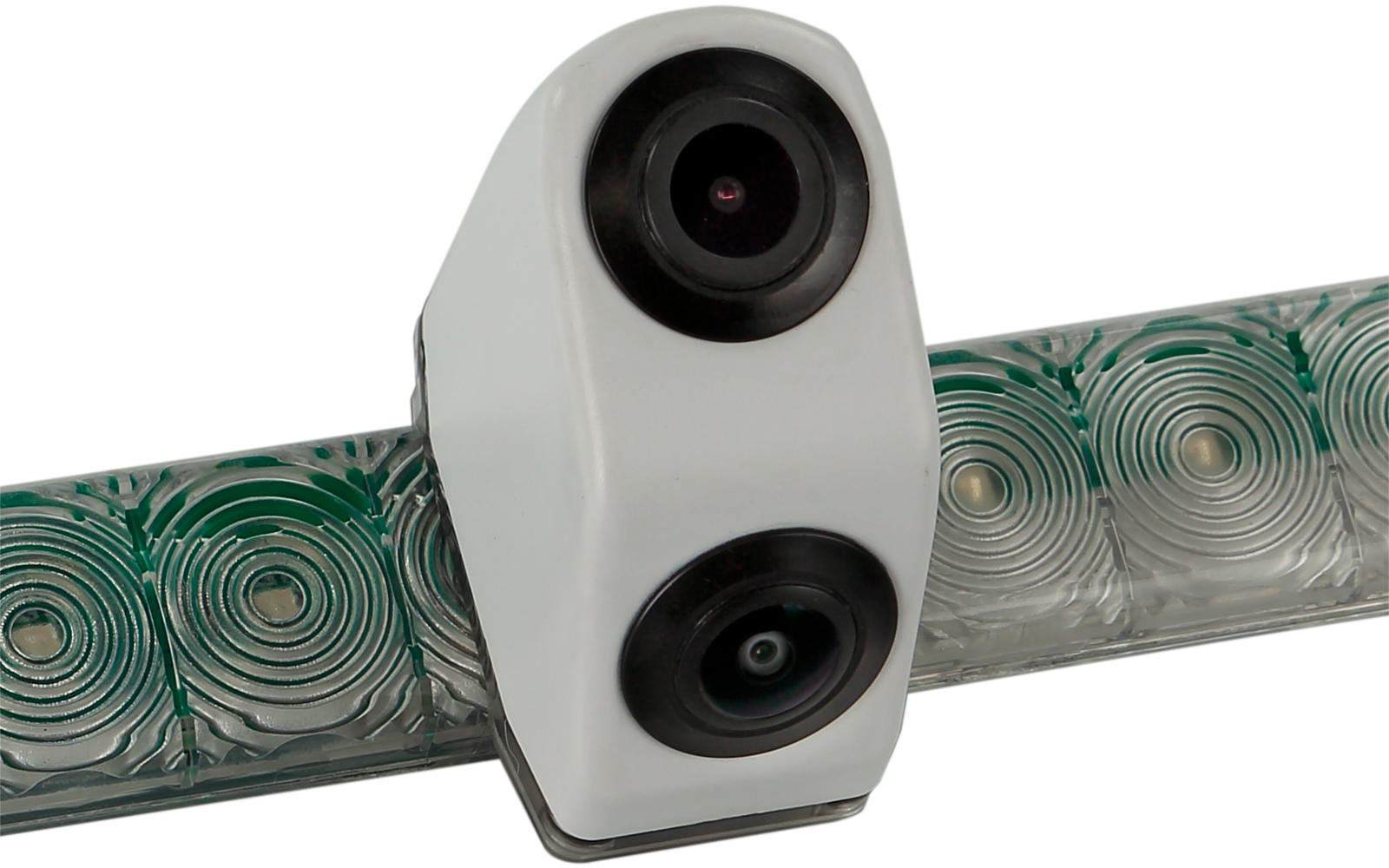weißes Gehäuse mit zwei runden schwarzen Linsen, befestigt an einem transparenten Stab mit grünen konzentrischen Kreisstrukturen