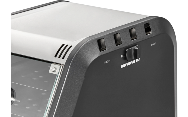 Front of a black and silver electronic device with switches and ventilation slots