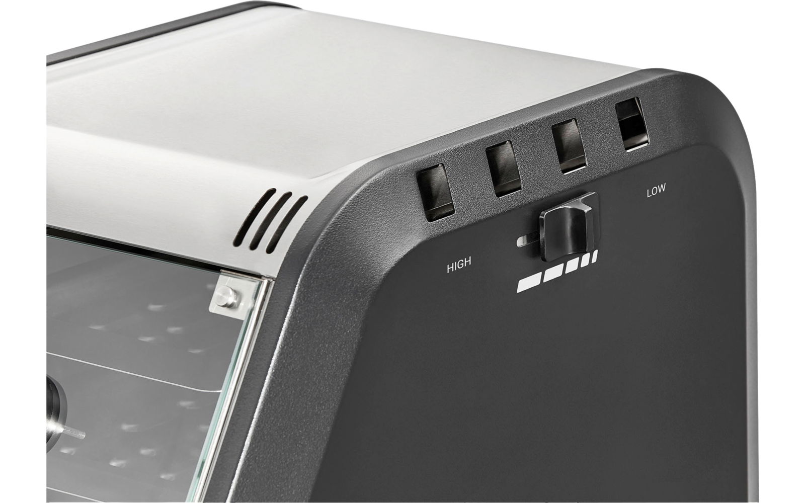 Front of a black and silver electronic device with switches and ventilation slots