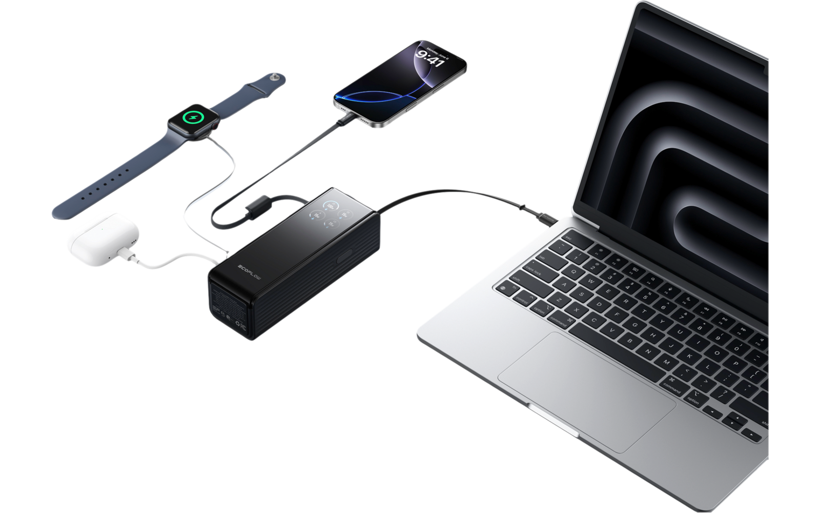 Ein Laptop, ein schwarzes Ladegerät, ein USB-Kabel und ein Kugelschreiber liegen auf einem weißen Tisch