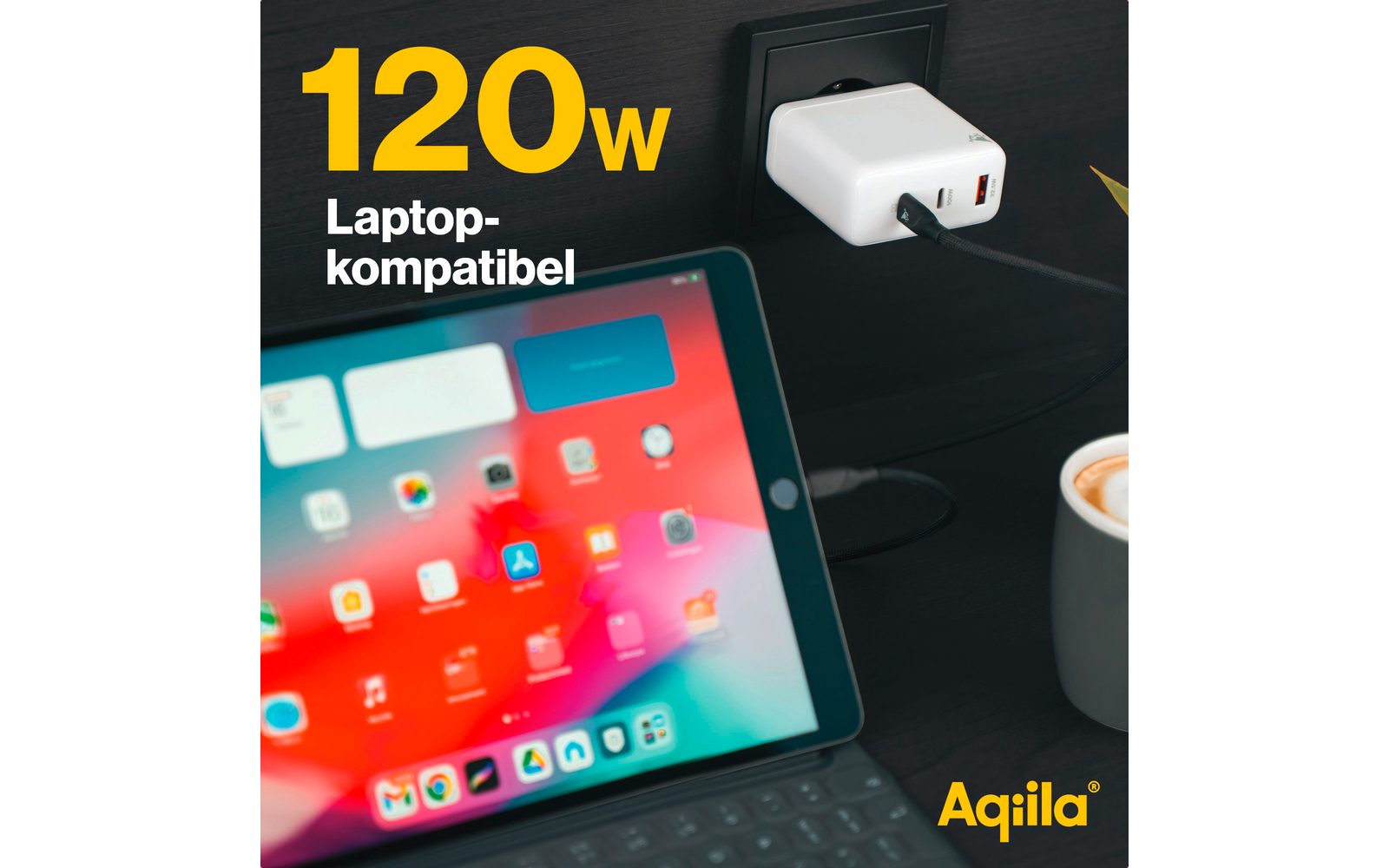 Tablet auf einem Tisch mit Ladegerät und Text „120W Laptop-kompatibel“