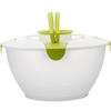 Bol rond blanc avec couvercle blanc, clips verts et poignée centrale verte composée de deux parties verticales