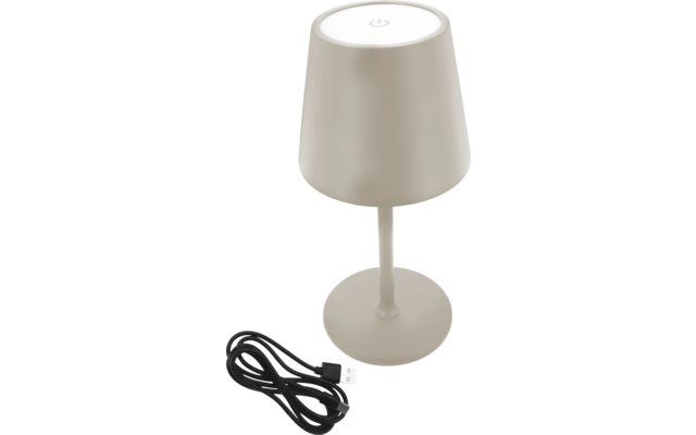 Beige Tischlampe mit rundem Schirm und losem USB-Kabel daneben