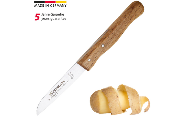 Schälmesser mit Holzgriff und Edelstahlklinge, auf der Klinge der Schriftzug 'WESTMARK', oben links deutsches Flaggenlogo mit 'MADE IN GERMANY' und '5 Jahre Garantie / years guarantee', daneben eine halb geschälte Kartoffel mit spiralem Schalenstreif