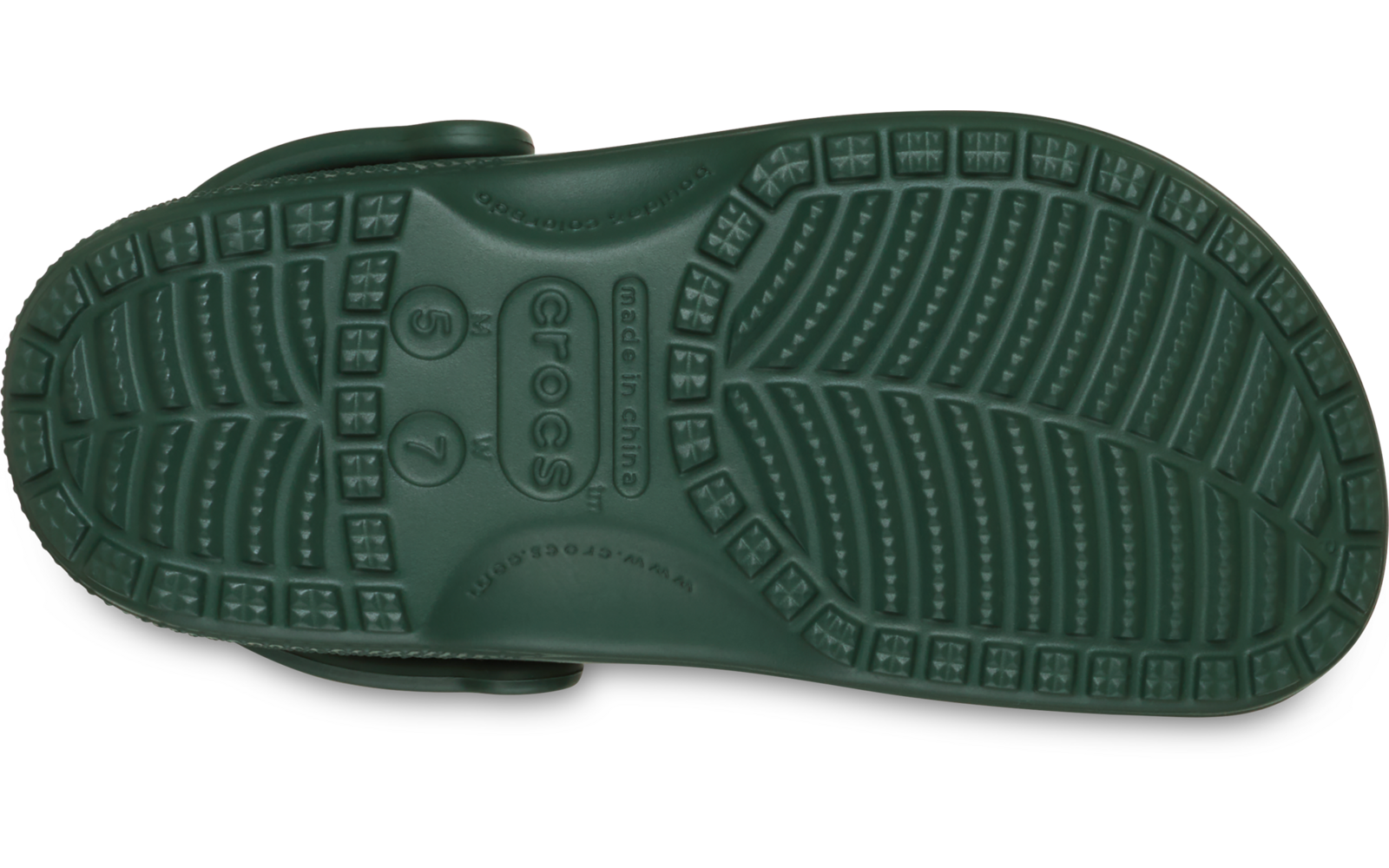 Grüne Sohle eines Clogs mit Profil, Aufschrift 'CROCS' und Fersenriemen