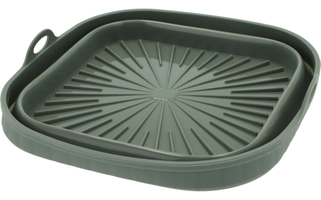 Oggetto quadrato verde-grigio flessibile con centro rigato, bordo rialzato e un'asola in un angolo