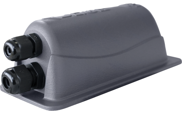 Objet rectangulaire gris à dessus arrondi ; à une extrémité étroite deux éléments cylindriques noirs côte à côte ; fond blanc