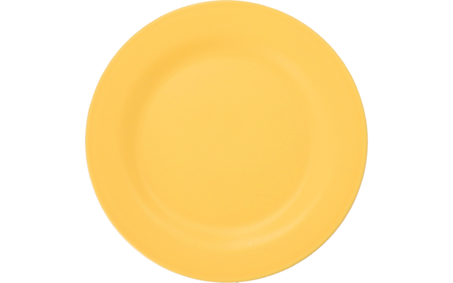 Gelber runder Teller von oben fotografiert