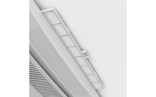 Nahaufnahme eines weißen Kastens mit Gitteröffnungen und einem angebauten verstellbaren Lamellenaufsatz