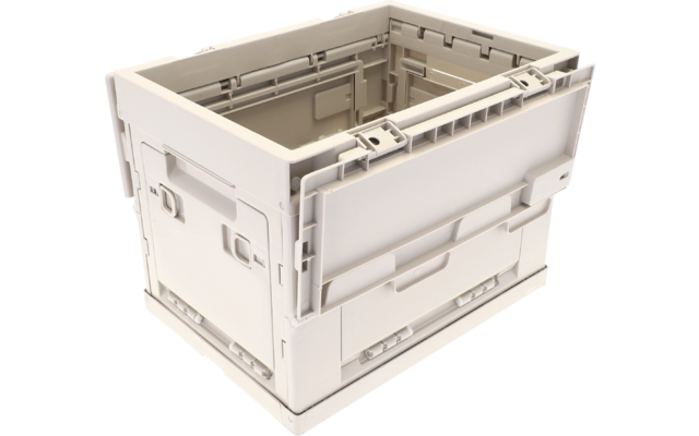 Offene rechteckige Kunststoffkiste in hellbeige mit Grifföffnungen, sichtbaren Scharnieren und Einrastungen