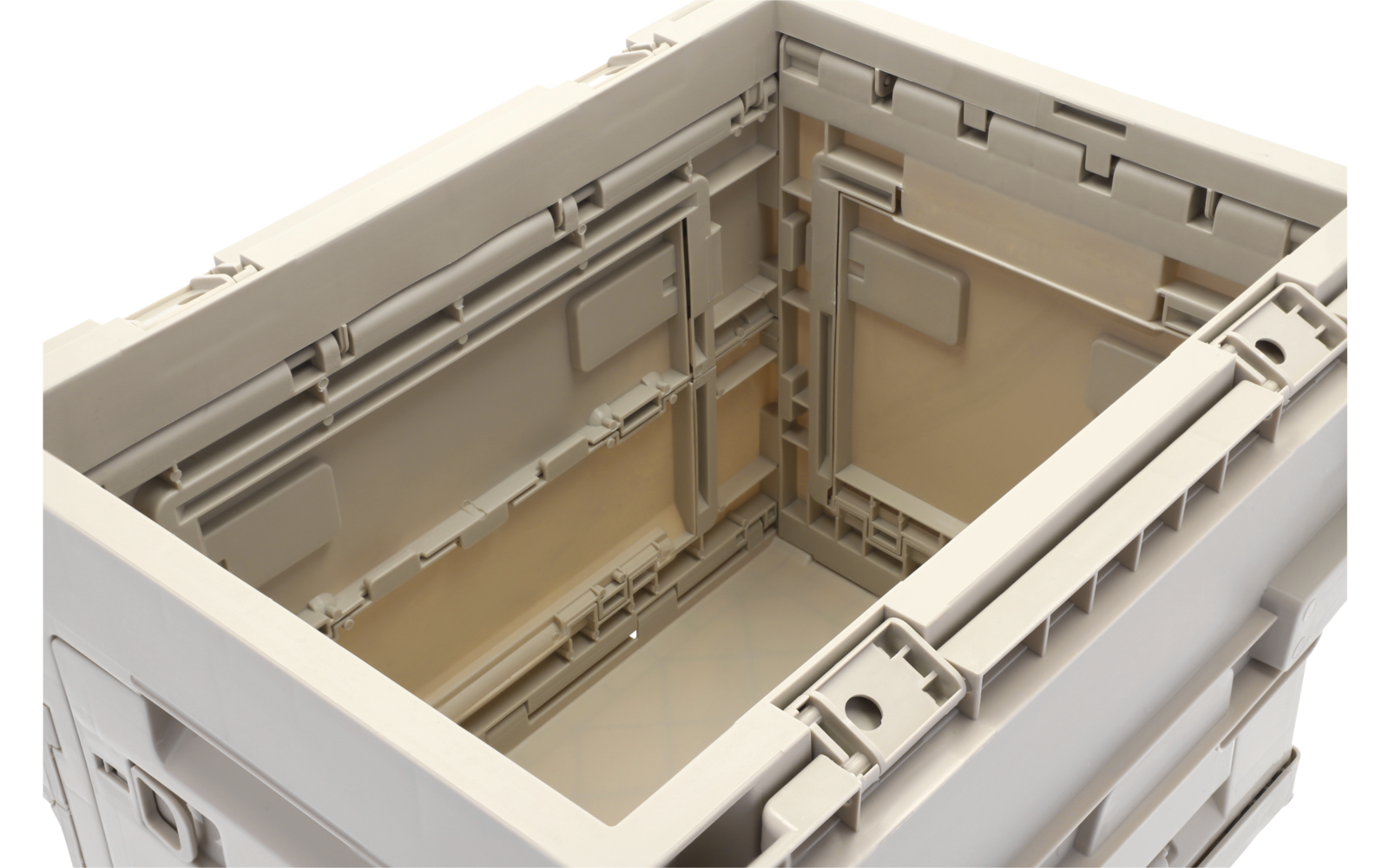 Offener, rechteckiger beiger Kunststoffbehälter mit sichtbarer Innenseite und Stapelrippen
