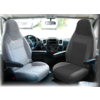 View of two front seats and the dashboard inside a vehicle