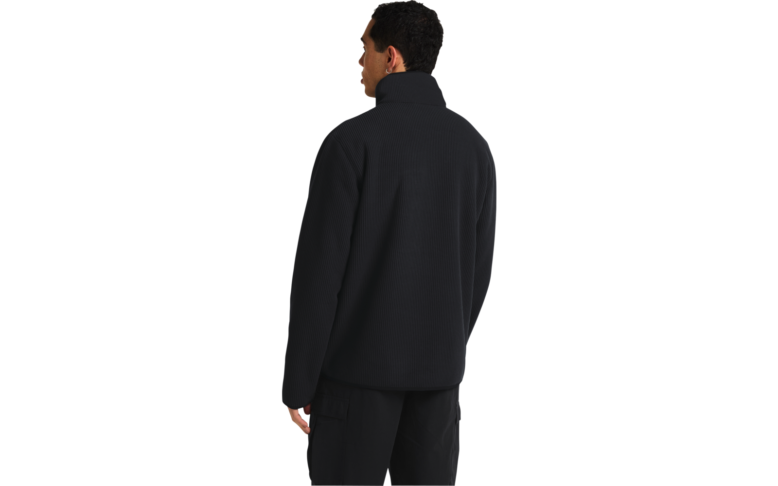 Person von hinten mit schwarzer Jacke und kurzem Haar