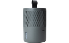 Altavoz portátil gris con asa y parte superior perforada