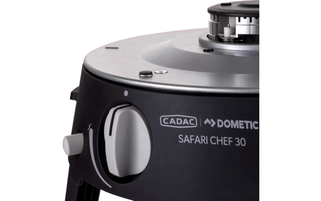 cocina de camping negra con perilla de control y superficie de acero inoxidable