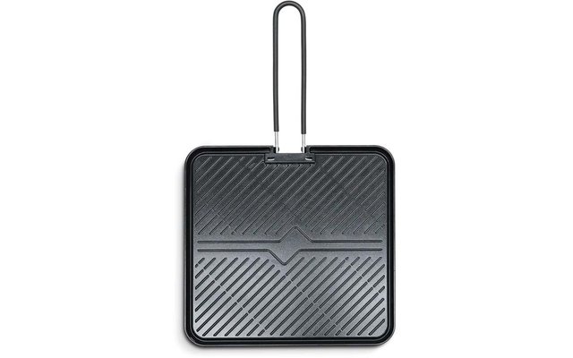 Vierkante zwarte grillplaat met diagonale ribbels, centraal scharnier en lange U-vormige handgreep