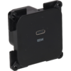Boîtier plastique noir carré aux coins arrondis avec quatre pattes de fixation aux angles ; port USB-C centré et inscription '65W' en dessous