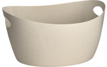 Récipient ovale ouvert beige avec deux ouvertures latérales pour poignées et une surface lisse