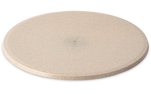 Ronde, platte, beige, fijn gespikkelde schijf op witte achtergrond met zachte schaduw