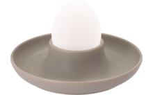 Weißes Ei in einem grauen Eierbecher auf weißem Hintergrund