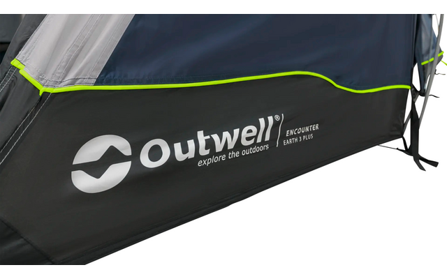 Nahaufnahme der Seitenwand eines schwarzen Zelts mit weißem Outwell-Logo und neongrüner Kante