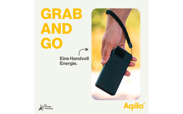 Main tenant un smartphone avec une poignée noire sur fond blanc, texte ‚GRAB AND GO‘ et ‚Une poignée d'énergie.‘