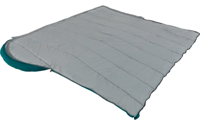 Eine gestreifte, rechteckige Matratze mit blauen Kanten