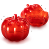 Rote, runde Container in Form von Tomaten, einer geöffnet