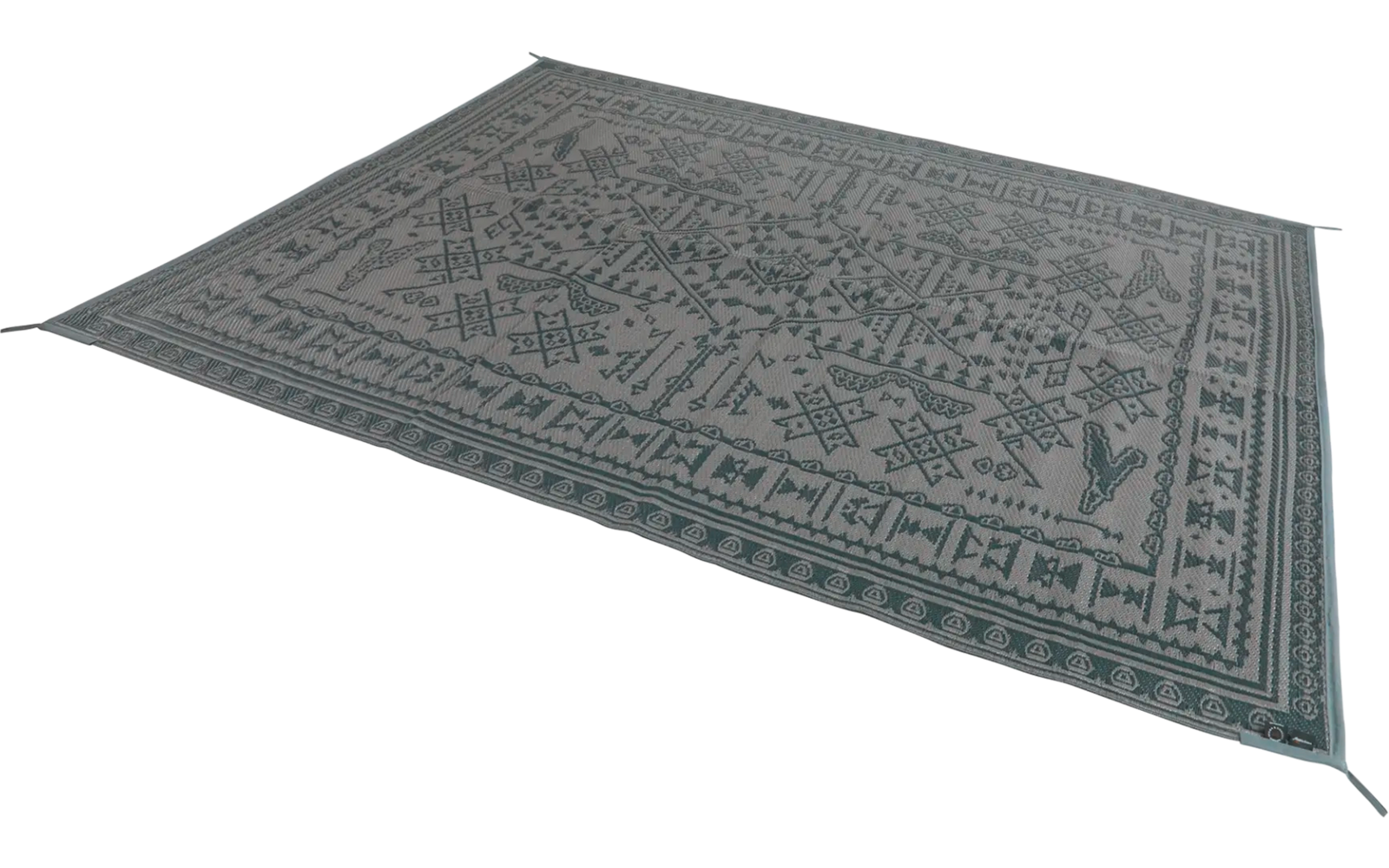 Blauer Teppich mit geometrischem Muster auf hellem Boden