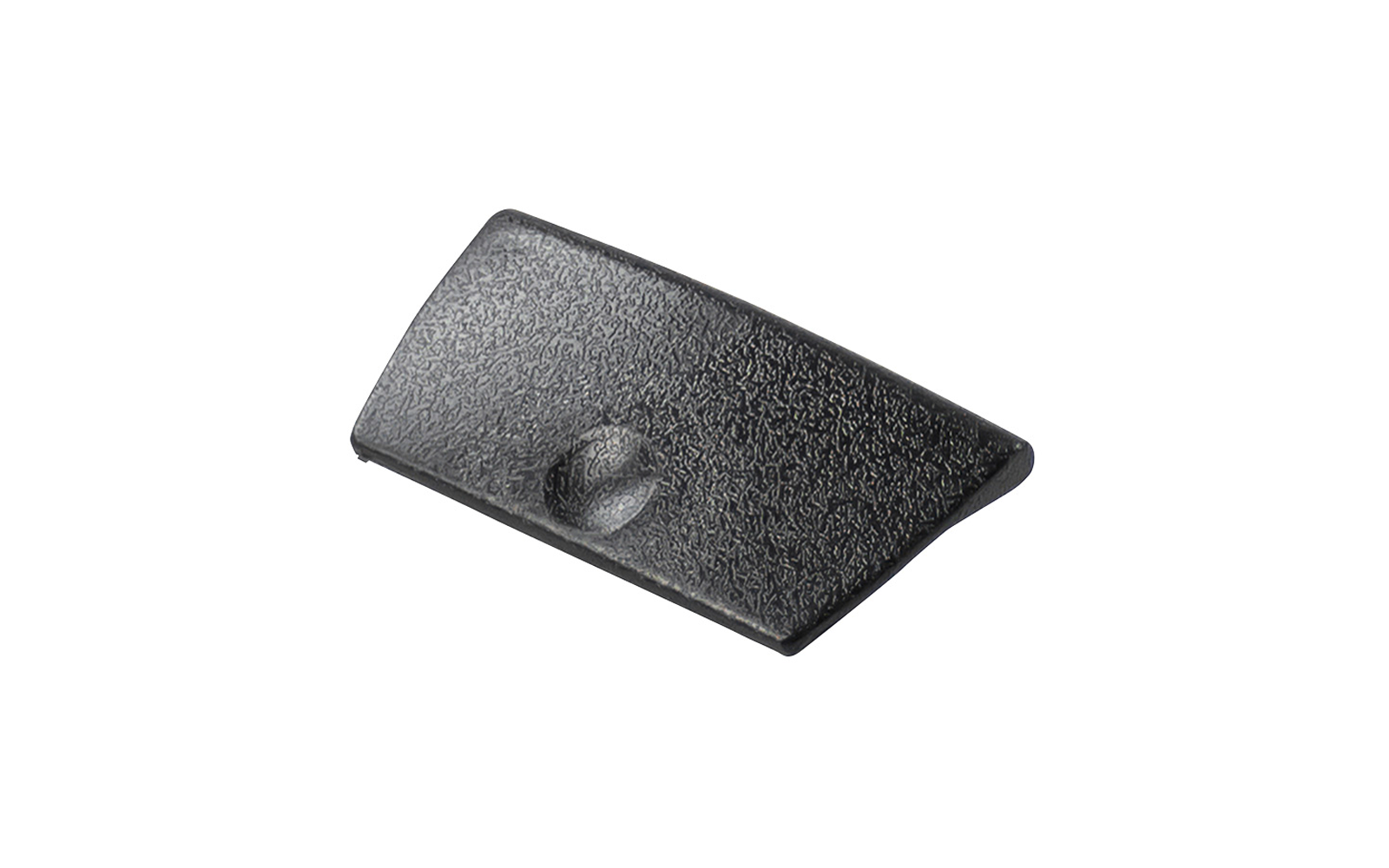 Pièce en plastique noire en forme trapézoïdale, surface texturée et petite dépression ronde