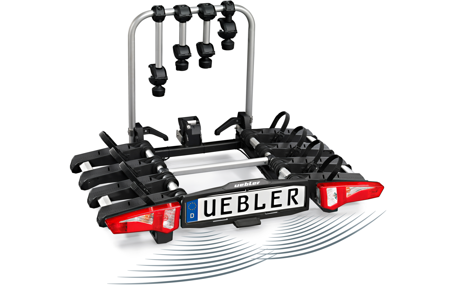 Schwarzer Fahrradträger mit silbernem Bügel, vier Haltearmen, roten Rücklichtern und weißem Nummernschild mit Aufschrift "UEBLER"