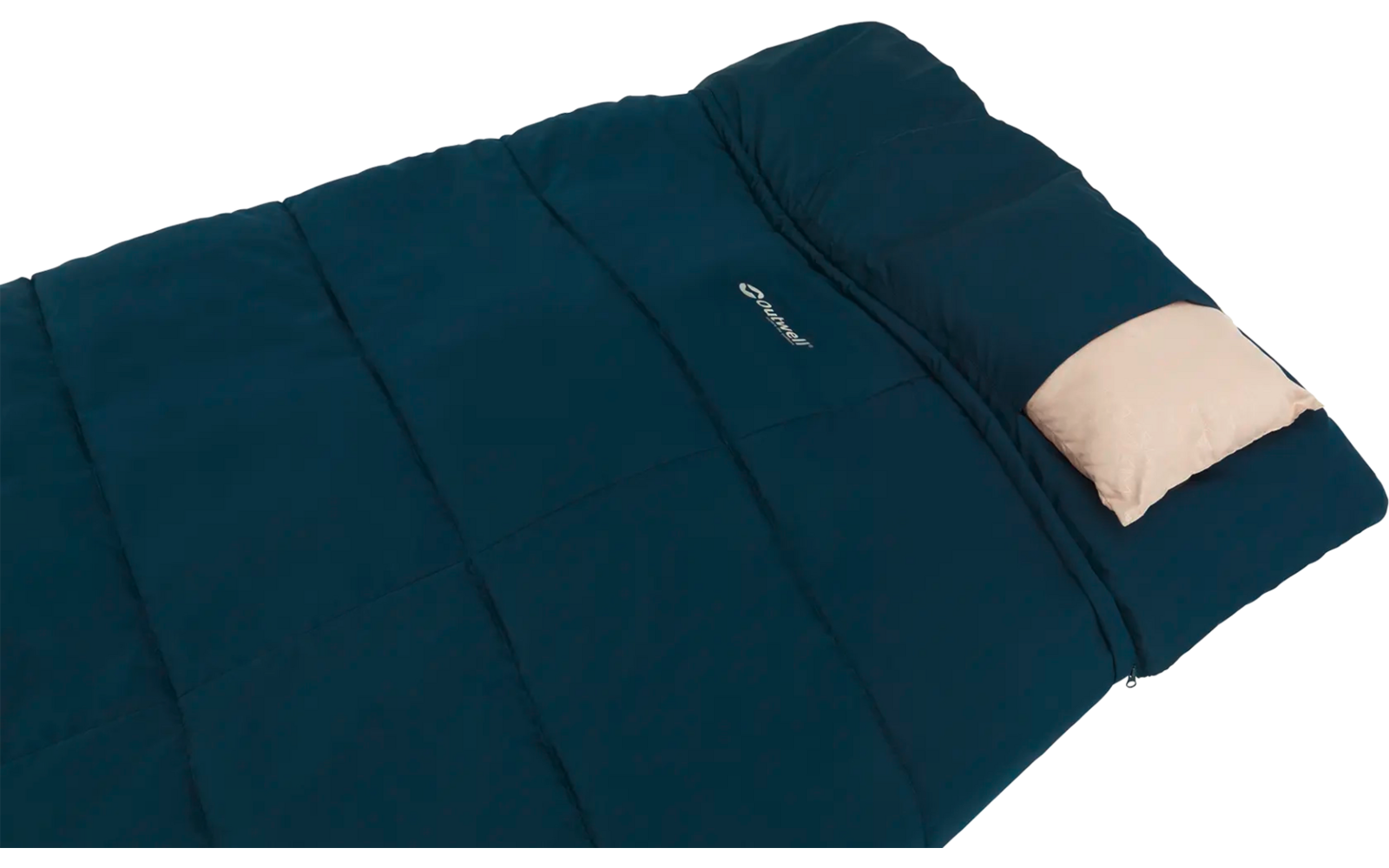 Dunkelblauer Schlafsack mit einem beige farbenen Kissen