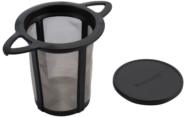 Objet cylindrique en maille métallique fine avec cadre en plastique noir et deux anses ; à côté, un couvercle rond en plastique noir embossé 'Westmark'